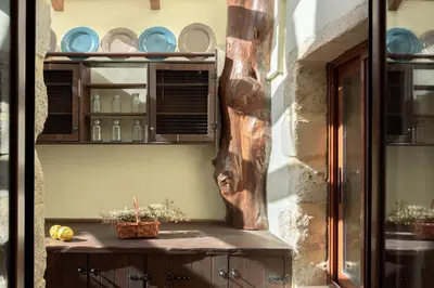 a table with plates and bowls on a wall at Nicole Villa I 