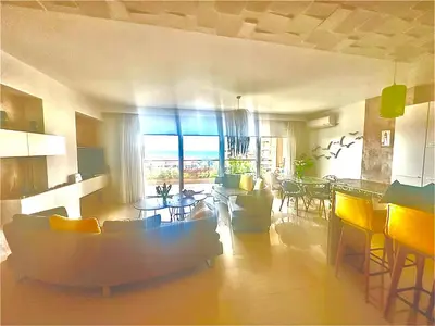 a living room with a couch and a table at W Apartment in Chania Town