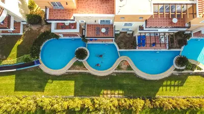 an aerial view of a swimming pool in a house at Chrispy Waterpark Resort - All inclusive in Kolymvari