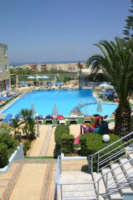 a view of a swimming pool in a resort at Futura Hotel in Maleme