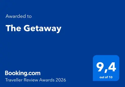 a blue screen with the getaways text on it at The Getaway in Agia Marina Nea Kydonias