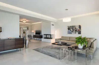 a living room with a couch and a table at Villa Pirgos Luxury in Kissamos