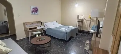 a hospital room with a bed and a table at Casa.Costiera in Palaiochóra