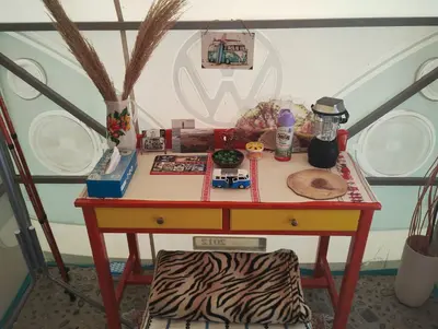 a desk with a table with food on it at Cornelia Hippie Magic Bus in Kissamos