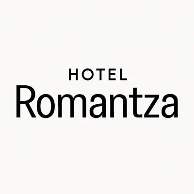a sign that reads hotel romananza with at ROMANTZA apartments in Agia Marina Nea Kydonias