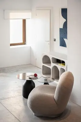 a living room with a chair and a coffee table at ALS - casa casa group in Chania Town