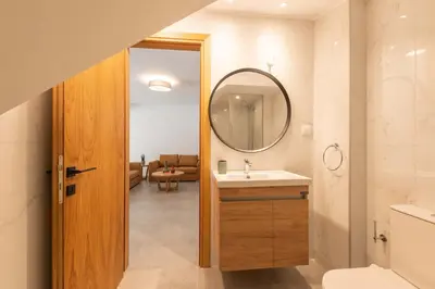 a bathroom with a sink and a mirror at Actea Seaview Villas I 