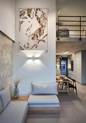 a living room with a couch and a table at Pachnes Luxury Apartments - Heated Pool, Sea View in Kounoupidhianá