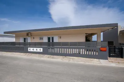 a house on the side of a street at Marakas Winery Family House in Xamoudhokhórion