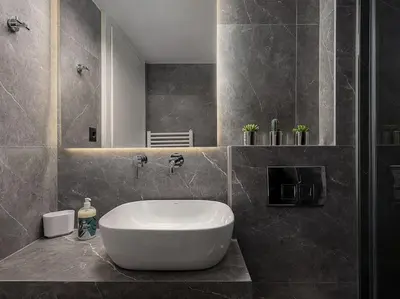 a bathroom with a large white tub in a room at Marita Luxury Apartment with parking space in Chania Town