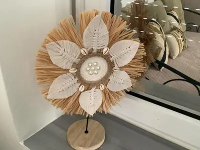 a flower made out of paper on a table at Granny's Nest in Kalyves