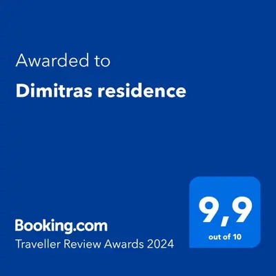a blue screen with the text awarded to christmas residence at Dimitras residence in Chania Town