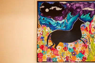 a painting of a painting of a wave at The Botanist Rooms, Ritzou in Chania Town