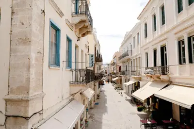an alley in an old town with buildings at The Botanist Rooms, Ritzou in Chania Town