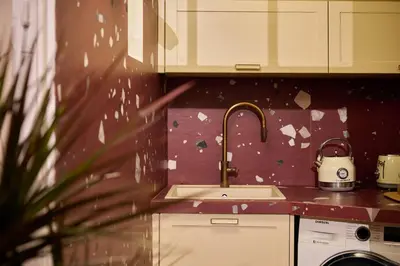 a kitchen with a sink and a counter top at Elyn House in Chania Town
