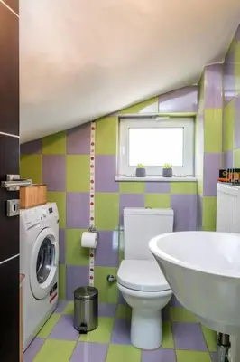 a bathroom with a toilet and a sink at Emma Hills Villa in Korakiaí