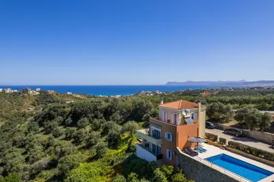 an aerial view of a villa with a swimming pool at Olive Tree Villa in Chania Town