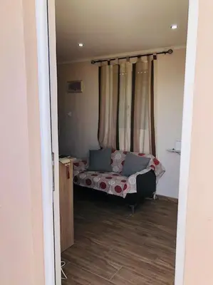 a bedroom with a bed in a room at Ariadni's apartment 3 in Chania Town