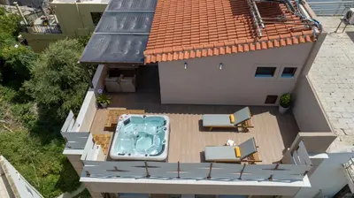 an aerial view of a house with a swimming pool at Aretousa Studio in Chania Town