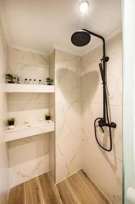 a shower with a glass door in a bathroom at Ontas apartment in Kissamos in Kissamos